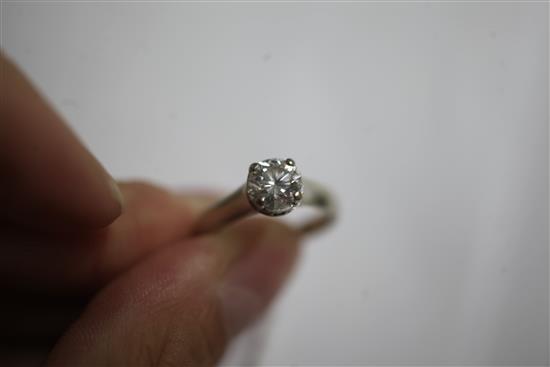 A diamond solitaire ring, white gold setting (jewellers certification: carat 1.14, colour: J, clarity SI1), size K/L.